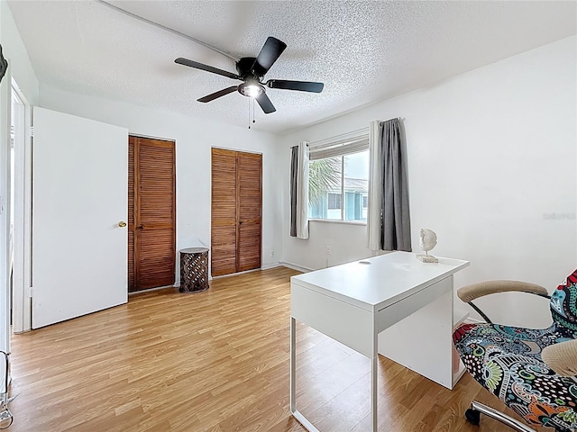 147 114th Ave NE Unit 147, Saint Petersburg, FL 33716 - office with light wood finished floors, ceiling fan, and a textured ceiling