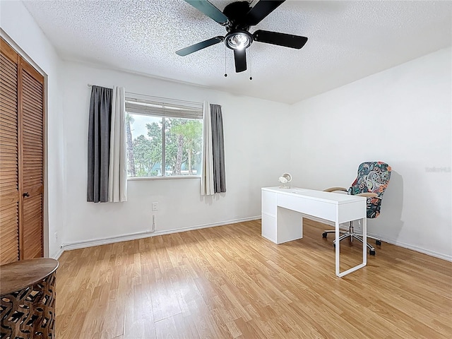 147 114th Ave NE Unit 147, Saint Petersburg, FL 33716 - office with light wood-style floors, a textured ceiling, baseboards, and ceiling fan