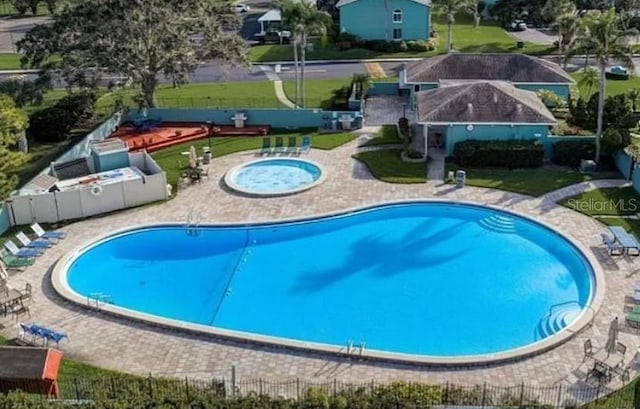 147 114th Ave NE Unit 147, Saint Petersburg, FL 33716 - community pool with a patio area