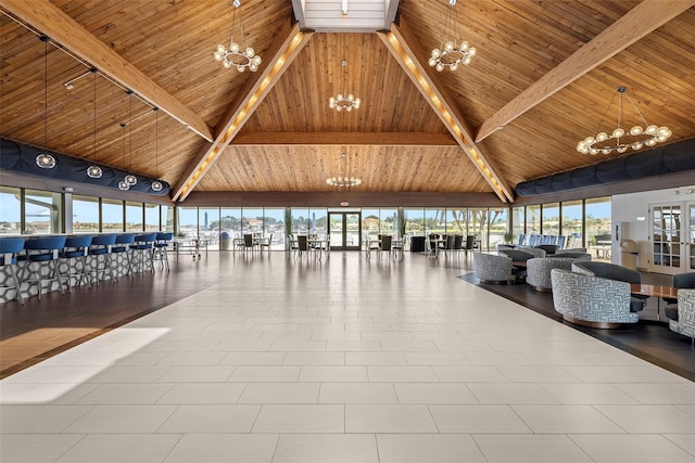 9425 Blind Pass Rd Unit 1008, St Pete Beach, FL 33706 - building lobby with high vaulted ceiling and wood ceiling with exposed beams