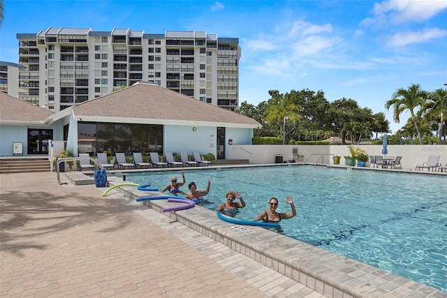 9425 Blind Pass Rd Unit 1008, St Pete Beach, FL 33706 - community pool with a patio
