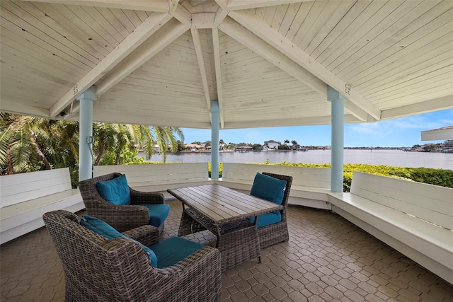 9425 Blind Pass Rd Unit 1008, St Pete Beach, FL 33706 - view of patio featuring a water view