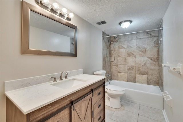 125 Picardy Villa Cir Unit 100, Brandon, FL 33510 - bathroom with vanity, toilet, shower / tub combination, a textured ceiling, and tile patterned floors