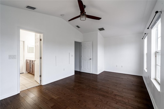 6940 47th Way N, Pinellas Park, FL 33781 - unfurnished room featuring ceiling fan, lofted ceiling, wood finished floors, and baseboards