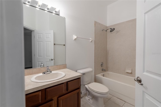 6940 47th Way N, Pinellas Park, FL 33781 - bathroom featuring toilet, vanity, tile patterned floors, and shower / bathtub combination
