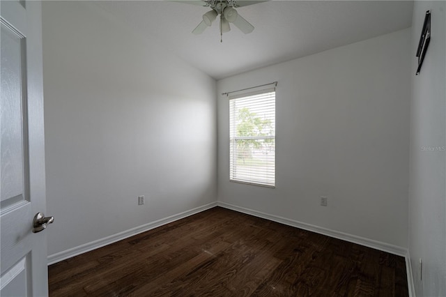 6940 47th Way N, Pinellas Park, FL 33781 - spare room featuring dark wood finished floors, a ceiling fan, baseboards, and vaulted ceiling