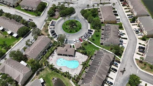6940 47th Way N, Pinellas Park, FL 33781 - aerial view of property and surrounding area featuring a pool area and nearby suburban area