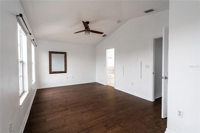 6940 47th Way N, Pinellas Park, FL 33781 - empty room featuring ceiling fan, vaulted ceiling, dark wood-style floors, and a smoke detector