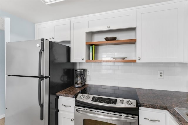 17334 Gulf Blvd Unit 203, North Redington Beach, FL 33708 - kitchen featuring appliances with stainless steel finishes, white cabinetry, open shelves, and decorative backsplash