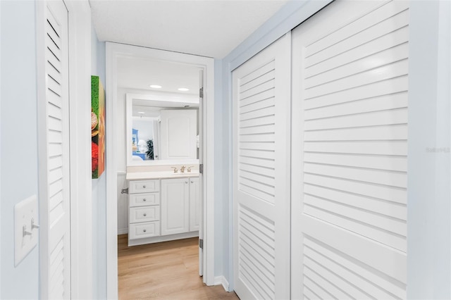 17334 Gulf Blvd Unit 203, North Redington Beach, FL 33708 - corridor featuring light wood-style floors and recessed lighting