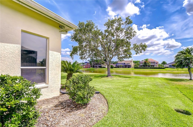4304 Place Le Manes, Lutz, FL 33558 - view of grassy yard with a water view and a residential view