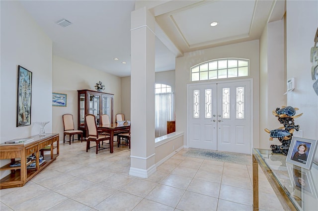 4304 Place Le Manes, Lutz, FL 33558 - entryway featuring light tile patterned floors, recessed lighting, baseboards, and french doors