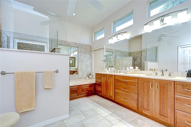 4304 Place Le Manes, Lutz, FL 33558 - full bathroom featuring ceiling fan, walk in shower, double vanity, a bath, and tile patterned floors