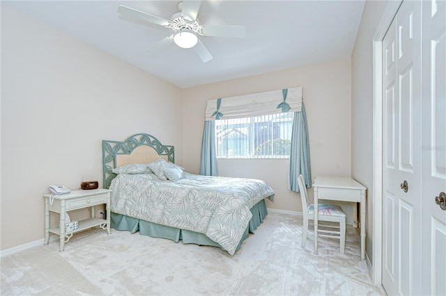 4304 Place Le Manes, Lutz, FL 33558 - bedroom with a closet, light carpet, baseboards, and a ceiling fan