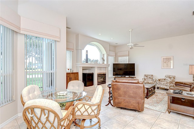4304 Place Le Manes, Lutz, FL 33558 - living area featuring light tile patterned flooring, ceiling fan, and a tiled fireplace
