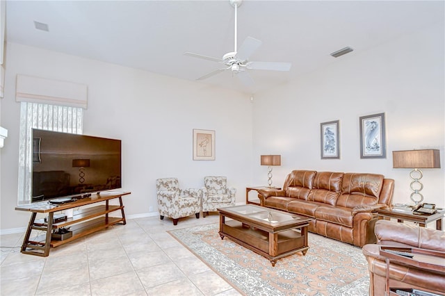 4304 Place Le Manes, Lutz, FL 33558 - living room with a ceiling fan, light tile patterned flooring, and baseboards