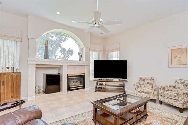 4304 Place Le Manes, Lutz, FL 33558 - tiled living room with a ceiling fan, a fireplace, and recessed lighting