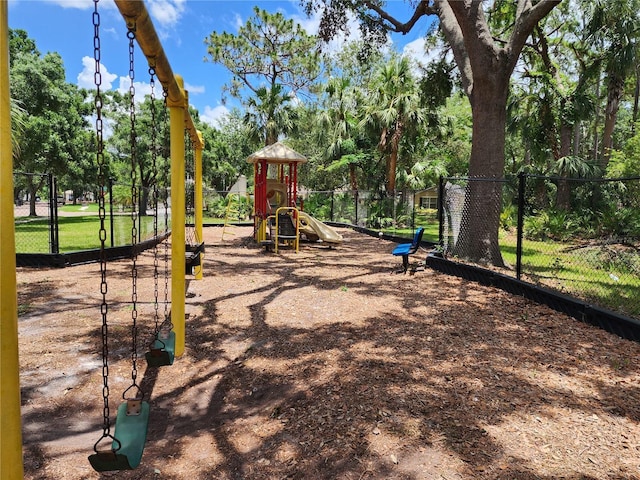 8313 Arabian Dunes Pl, Riverview, FL 33578 - community play area with view of wooded area