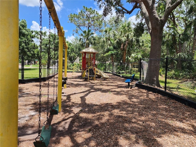 8313 Arabian Dunes Pl, Riverview, FL 33578 - community jungle gym with view of scattered trees