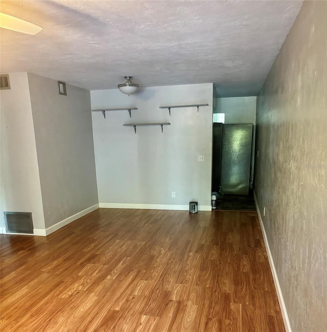 4020 55th St N Unit 1106, Kenneth City, FL 33709 - empty room with wood finished floors and baseboards