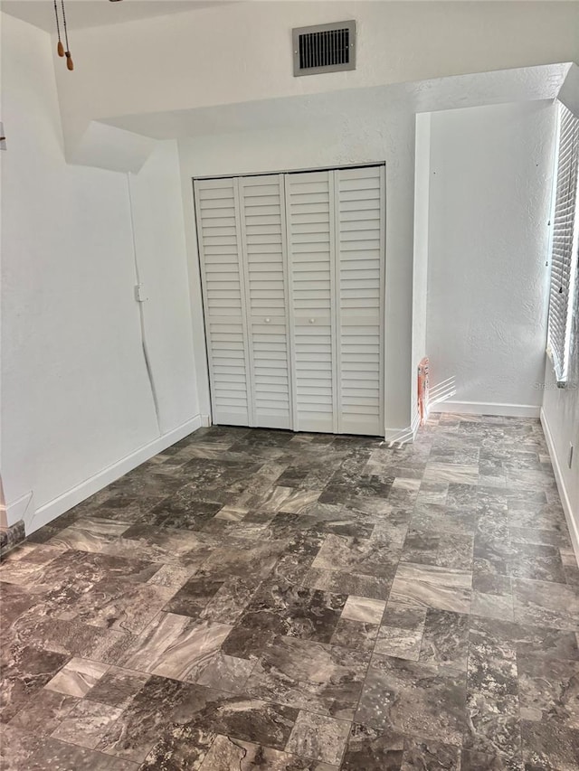 4020 55th St N Unit 1106, Kenneth City, FL 33709 - garage featuring baseboards