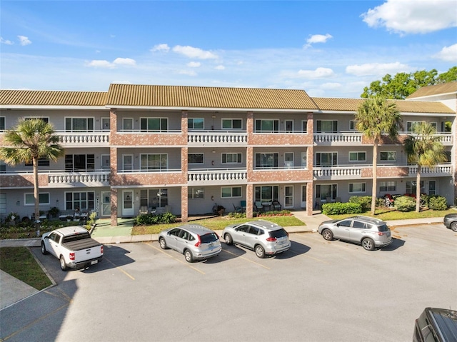 2461 Rhodesian Dr Unit 47, Clearwater, FL 33763 - view of building exterior with uncovered parking