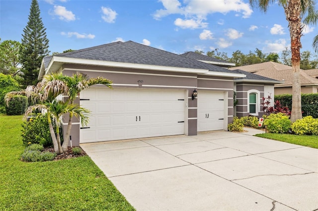 4505 Anaconda Dr, New Port Richey, FL 34655 - view of front facade featuring an attached garage, stucco siding, concrete driveway, and roof with shingles