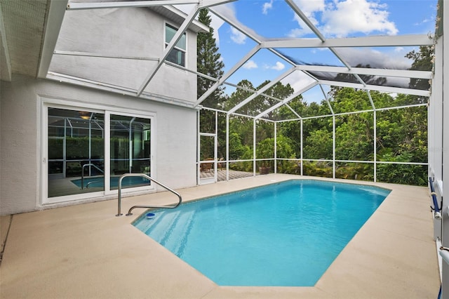 4505 Anaconda Dr, New Port Richey, FL 34655 - outdoor pool with a patio and a lanai