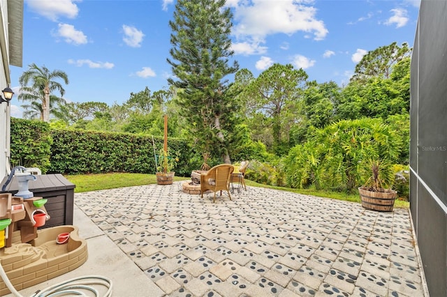 4505 Anaconda Dr, New Port Richey, FL 34655 - fenced backyard with a patio area