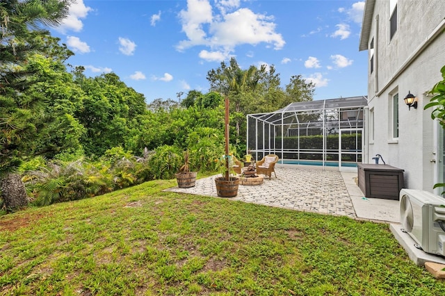 4505 Anaconda Dr, New Port Richey, FL 34655 - view of green lawn with a patio area, ac unit, an outdoor pool, and a lanai