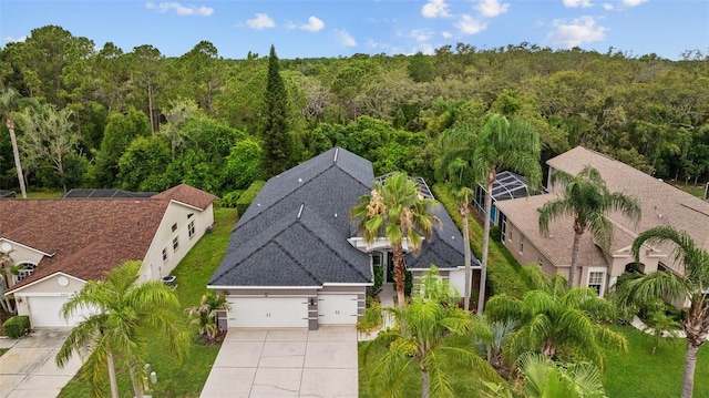 4505 Anaconda Dr, New Port Richey, FL 34655 - aerial view of property and surrounding area with a forest