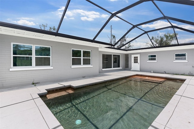 837 E Edgewood Dr, Lakeland, FL 33803 - back of house with a patio area, an outdoor pool, and a lanai