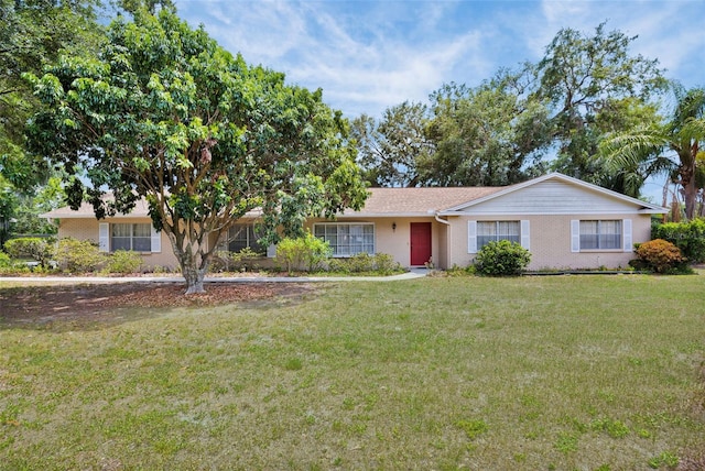 321 Belle View Ave, Temple Terrace, FL 33617 - single story home featuring a front yard and brick siding