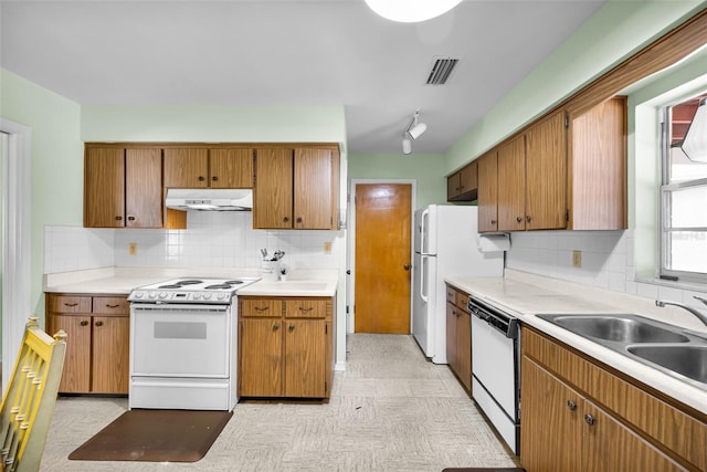 321 Belle View Ave, Temple Terrace, FL 33617 - kitchen with white appliances, ventilation hood, light floors, a sink, and brown cabinetry