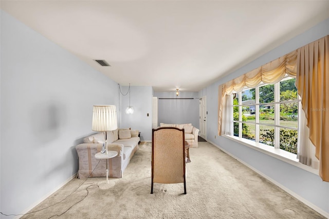 321 Belle View Ave, Temple Terrace, FL 33617 - living area featuring baseboards and carpet