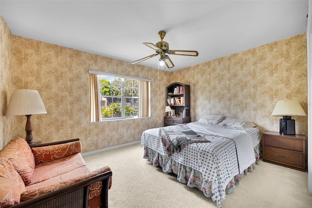321 Belle View Ave, Temple Terrace, FL 33617 - bedroom with carpet flooring, wallpapered walls, and a ceiling fan