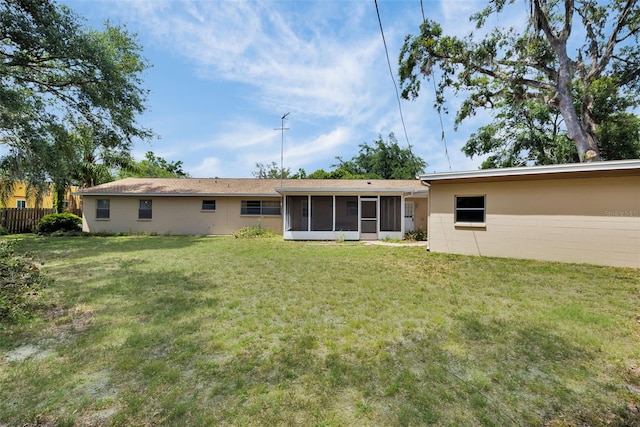 321 Belle View Ave, Temple Terrace, FL 33617 - back of house with a sunroom