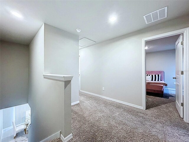 32451 Limitless Pl, Wesley Chapel, FL 33545 - hall featuring carpet flooring, an upstairs landing, baseboards, and recessed lighting