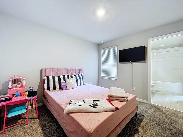 32451 Limitless Pl, Wesley Chapel, FL 33545 - bedroom with carpet floors, connected bathroom, and baseboards