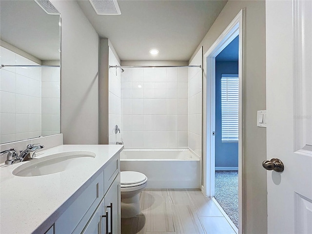 32451 Limitless Pl, Wesley Chapel, FL 33545 - bathroom with vanity, toilet, shower / tub combination, baseboards, and recessed lighting