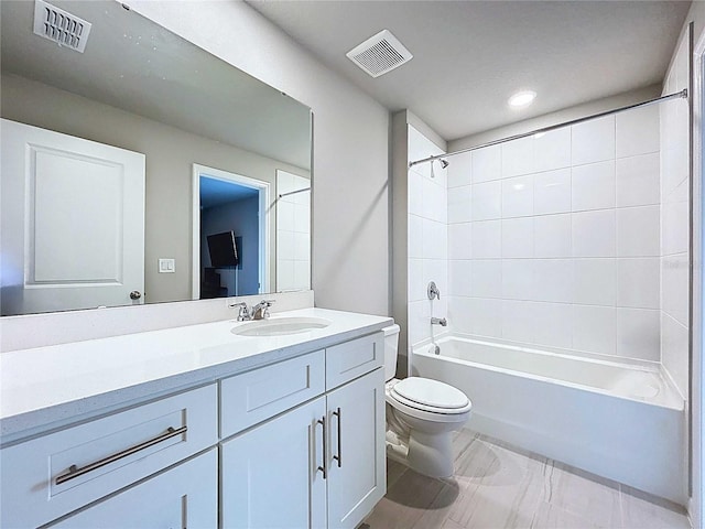 32451 Limitless Pl, Wesley Chapel, FL 33545 - bathroom featuring toilet, vanity, bathtub / shower combination, and recessed lighting