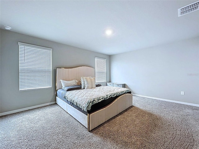 32451 Limitless Pl, Wesley Chapel, FL 33545 - carpeted bedroom featuring baseboards