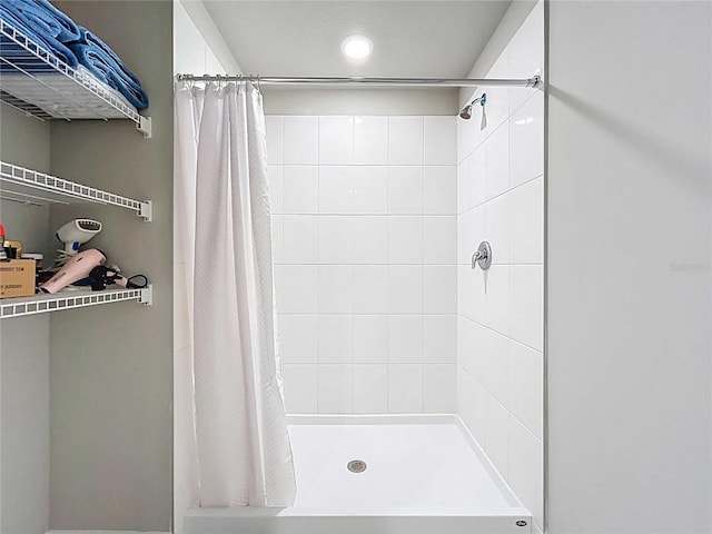 32451 Limitless Pl, Wesley Chapel, FL 33545 - bathroom with a tile shower and recessed lighting