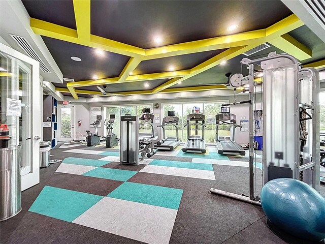 32451 Limitless Pl, Wesley Chapel, FL 33545 - exercise room with plenty of natural light, coffered ceiling, a ceiling fan, and recessed lighting