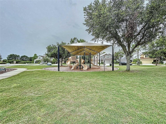 32451 Limitless Pl, Wesley Chapel, FL 33545 - surrounding community featuring a yard