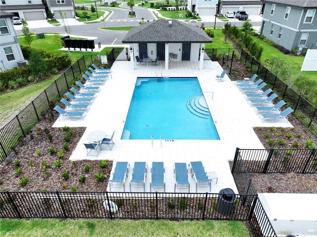 32451 Limitless Pl, Wesley Chapel, FL 33545 - community pool with a patio