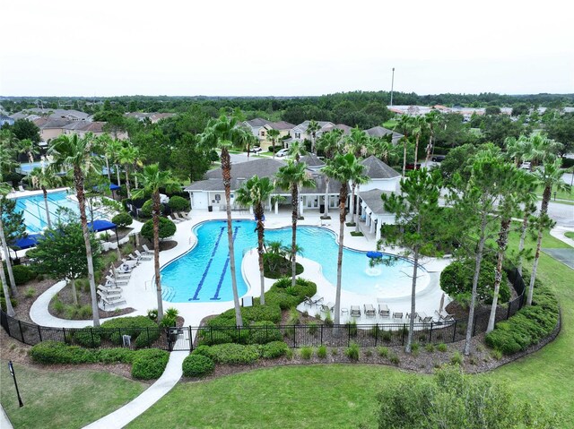 32451 Limitless Pl, Wesley Chapel, FL 33545 - community pool with a patio area and a residential view