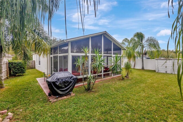 25101 Hyde Park Blvd, Land O Lakes, FL 34639 - rear view of property featuring a sunroom