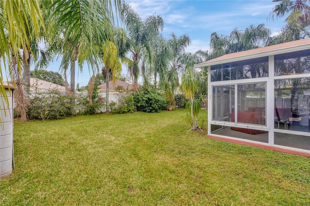 25101 Hyde Park Blvd, Land O Lakes, FL 34639 - view of yard featuring a sunroom