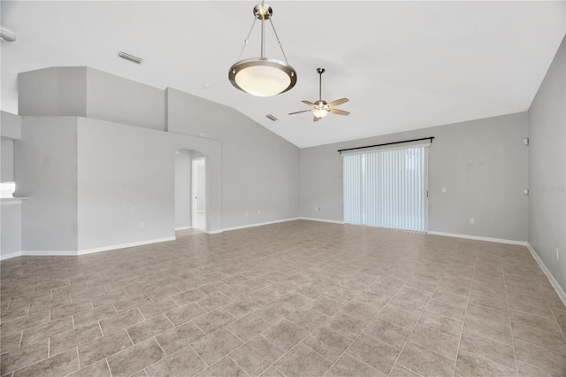 25101 Hyde Park Blvd, Land O Lakes, FL 34639 - spare room with ceiling fan, lofted ceiling, arched walkways, and baseboards